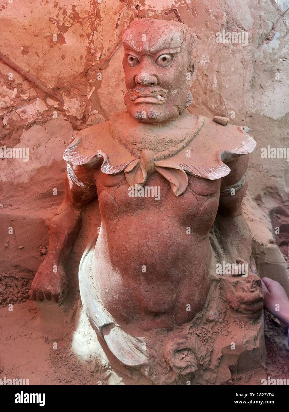 (210608) -- XI'AN, June 8, 2021 (Xinhua) -- File photo taken on May 24, 2020 shows a clay statue unearthed from the remains of the Qingpingbao castle, located in Jingbian County, Yulin City of northwest China's Shaanxi Province. The remains of a Great Wall castle dating back to the Ming Dynasty (1368-1644) were discovered in northwest China's Shaanxi Province, said the Shaanxi Academy of Archaeology Tuesday.   Architectural relics, including two courtyards, were found at the remains of the Qingpingbao castle. (Xinhua) Stock Photo