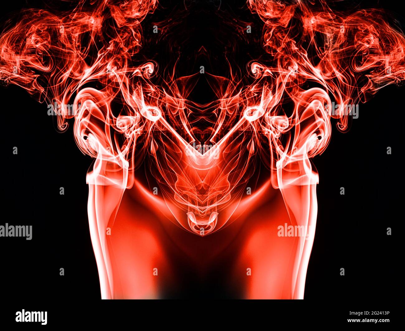Red smoke on a black background Stock Photo