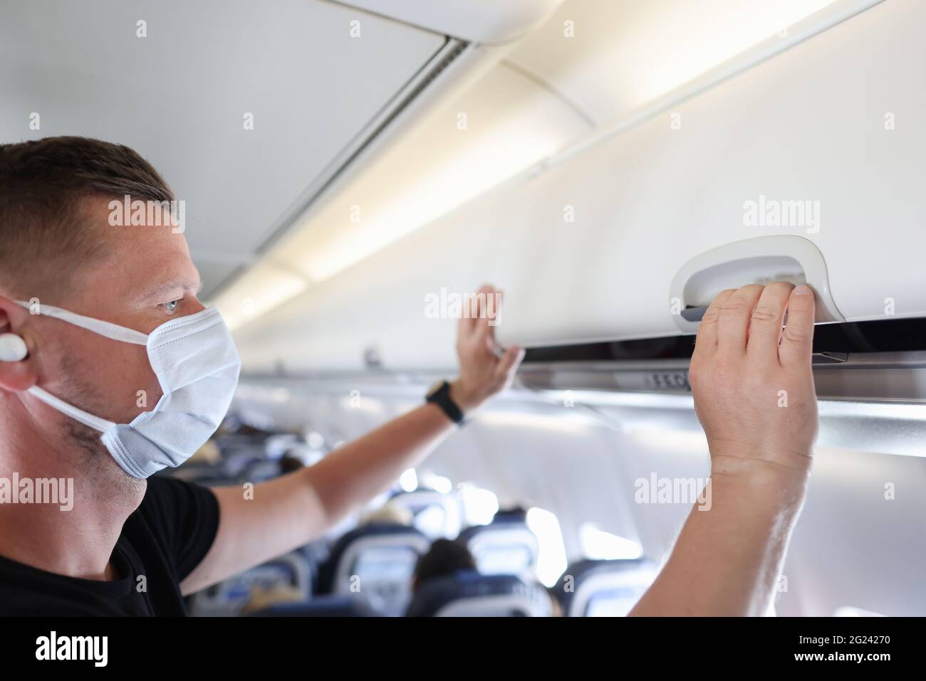 Airplane luggage rack hires stock photography and images Alamy