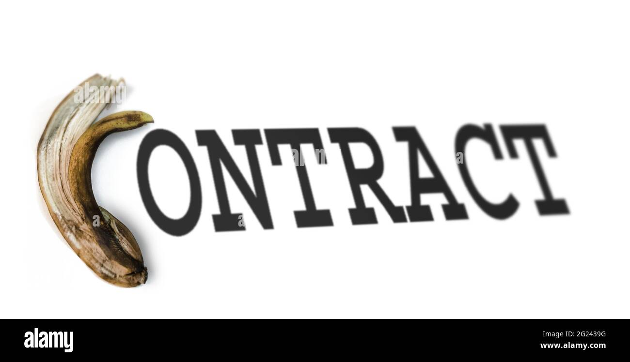 The letter C in the word 'CONTRACT' is replaced by a banana peel. Stock Photo
