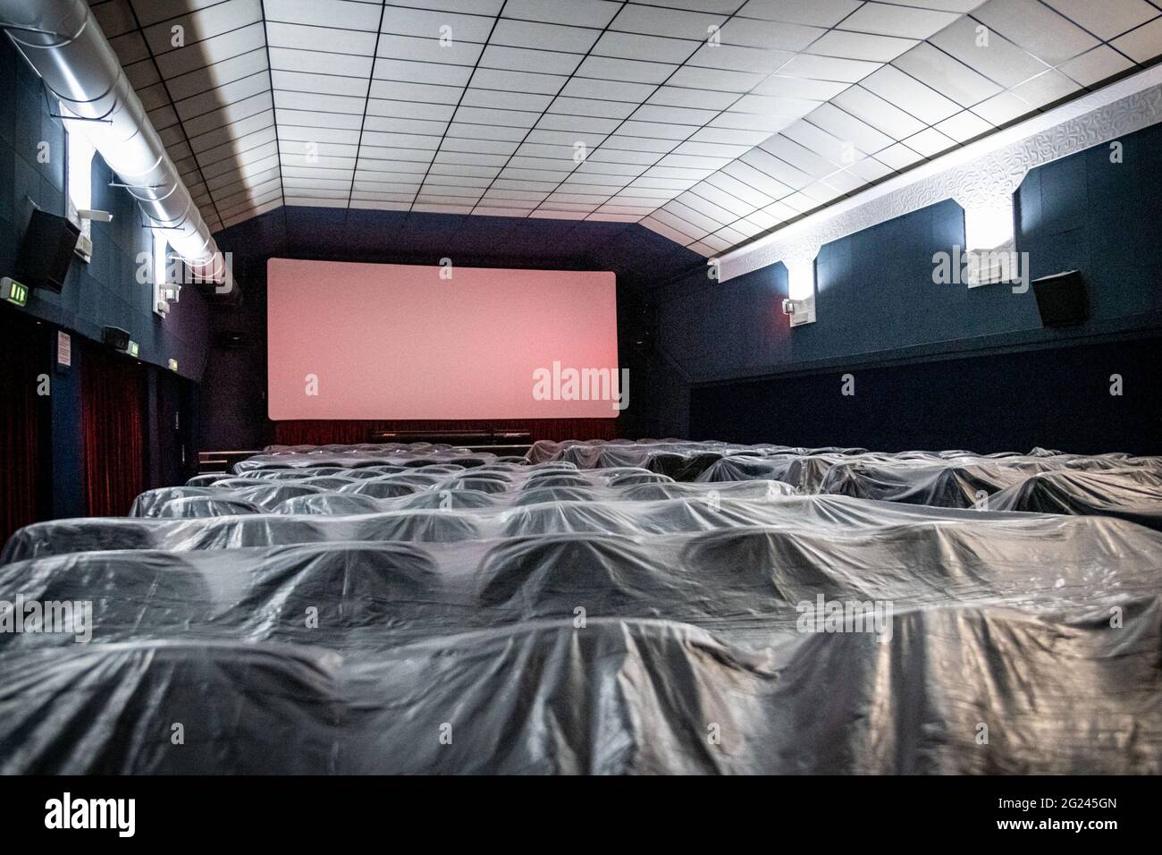 Milan - Cinema. Cinema Mexico in Via Savona. The empty cinema hall with  chairs wrapped in plastic during closure due to the Coronavirus emergency  (Mil Stock Photo - Alamy