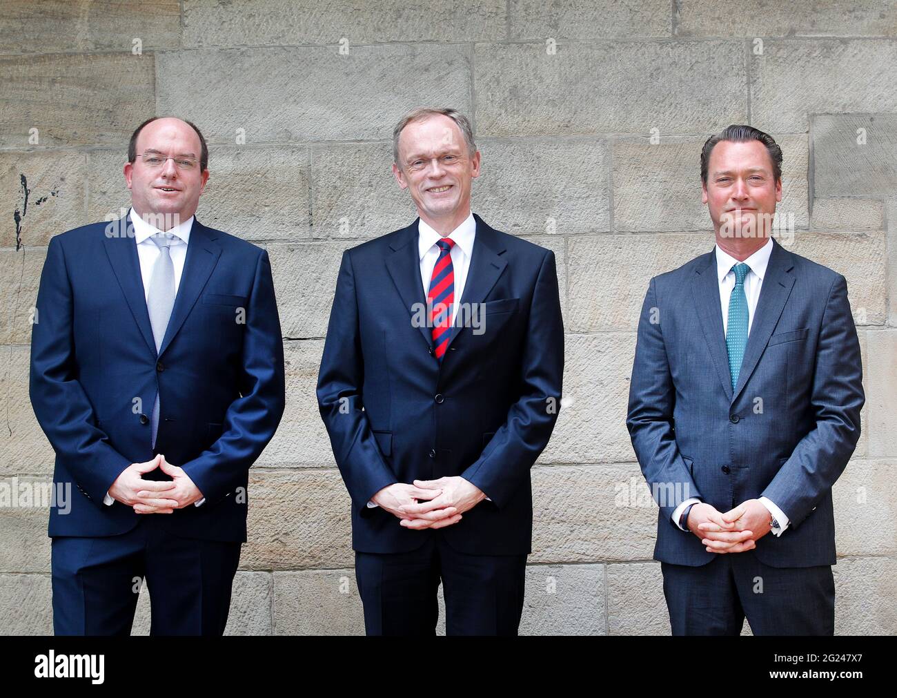 Duisburg, Germany. 08th June, 2021. Hendrik Schulte (center), Chairman of the Supervisory Board of Duisburger Hafen AG, introduces Markus Bangen (right), who will become the new Chief Executive Officer of Duisburger Hafen AG at the end of the year, and the new member of the Executive Board, Carsten Hinne. Credit: Roland Weihrauch/dpa/Alamy Live News Stock Photo