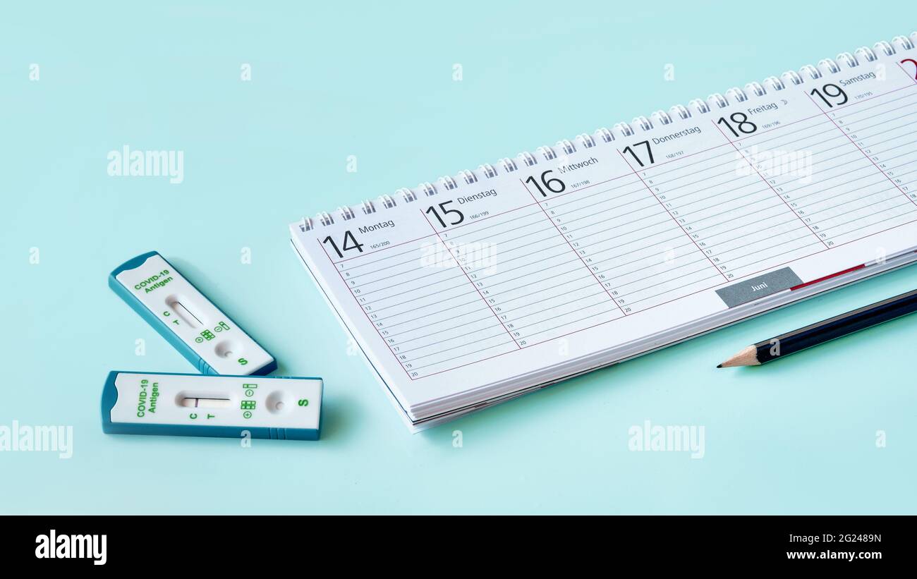 Banner with shnelltest, weekly planner, calendar, pencil on mint blue