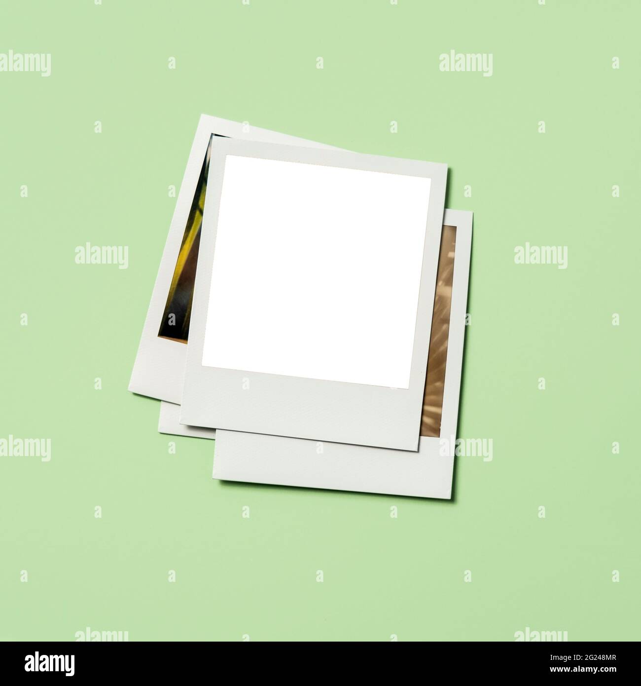 Stack of instant pictures with blank on top Stock Photo - Alamy