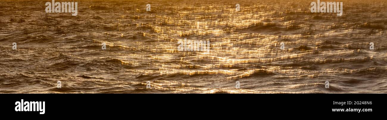 Water surface reflecting golden hi-res stock photography and images - Alamy