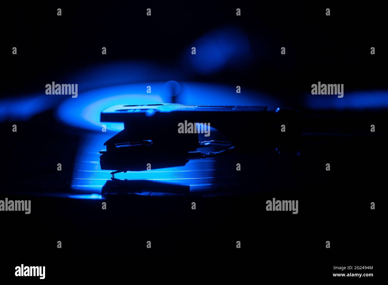 Close Up Of A Record Player Needle On Record In Blue Light Stock Photo Alamy