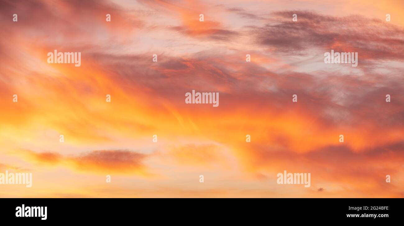 Sunset sky with golden clouds Stock Photo - Alamy