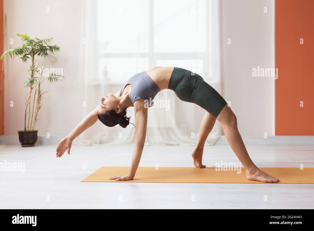 young woman with hands up. in the so-called t-pose used in 3D modeling of  human poses Stock Photo