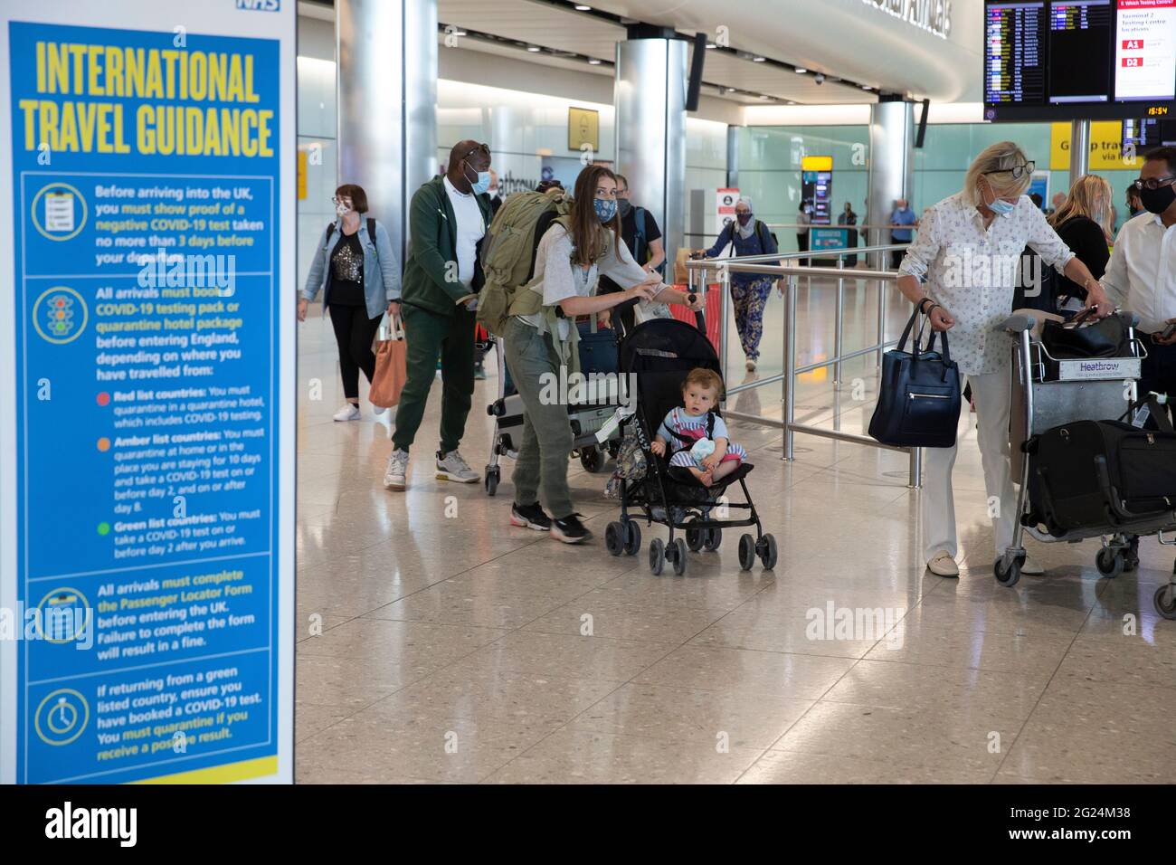 London, UK. 8th June, 2021. Passengers arriving at Heathrow as Portugal moves onto the Amber list. Many passengers were unable to catch a plane before the 4am deadline. Travel arrangements will be updated by the Government. British holidaymakers in Portugal are rushing back home before the country is added to the UK's travel amber list amid concerns about rising Covid cases. From 04:00 BST on Tuesday Portugal will be dropped from the green list, and returnees made to self-isolate for 10 days and take two PCR tests. Credit: Mark Thomas/Alamy Live News Stock Photo