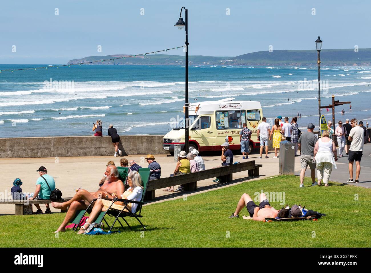 The seaside town of Westward Ho is packed full of tourists soaking up the sun Stock Photo