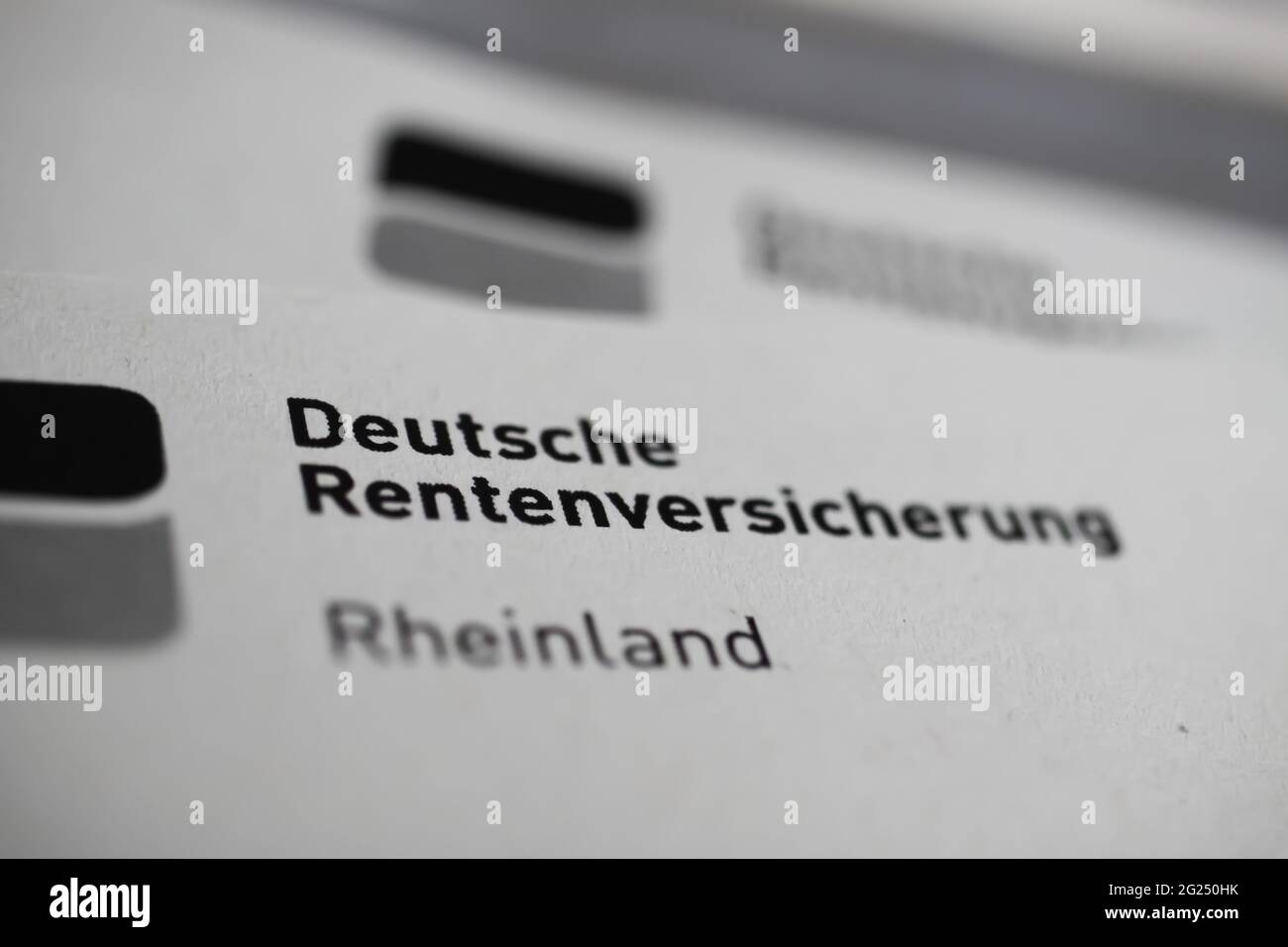 Viersen, Germany - May 9. 2021: Closeup of deutsche rentenversicherung logo lettering on statutory pension notice Stock Photo