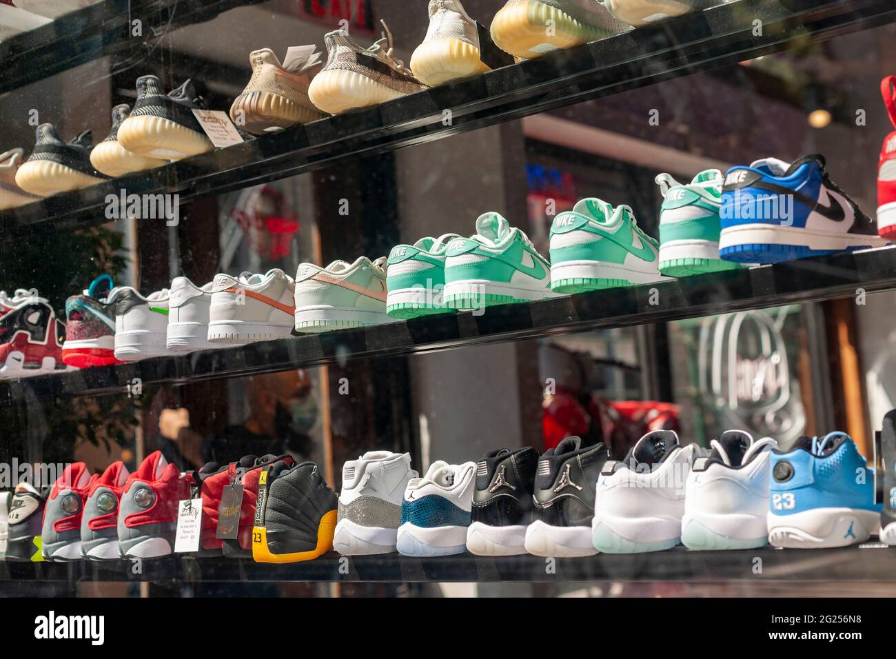 Collectible sneakers in the window of the Laced Up sneaker store in NoHo in  New York on Sunday, June 6, 2021. (© Richard B. Levine Stock Photo - Alamy