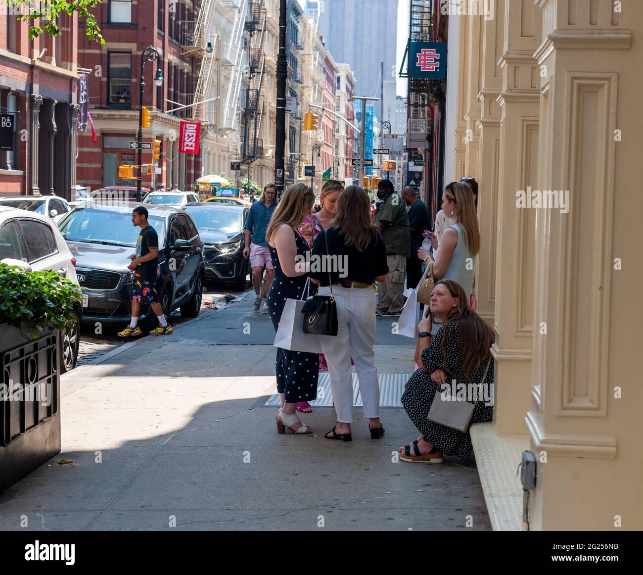 Shoppers in the Soho neighborhood in New York on Sunday, June 6, 2021. New York has relaxed mask mandates allowing most outdoor activities to be mask free as well as many indoor settings, with caveats. (© Richard B. Levine) Stock Photo