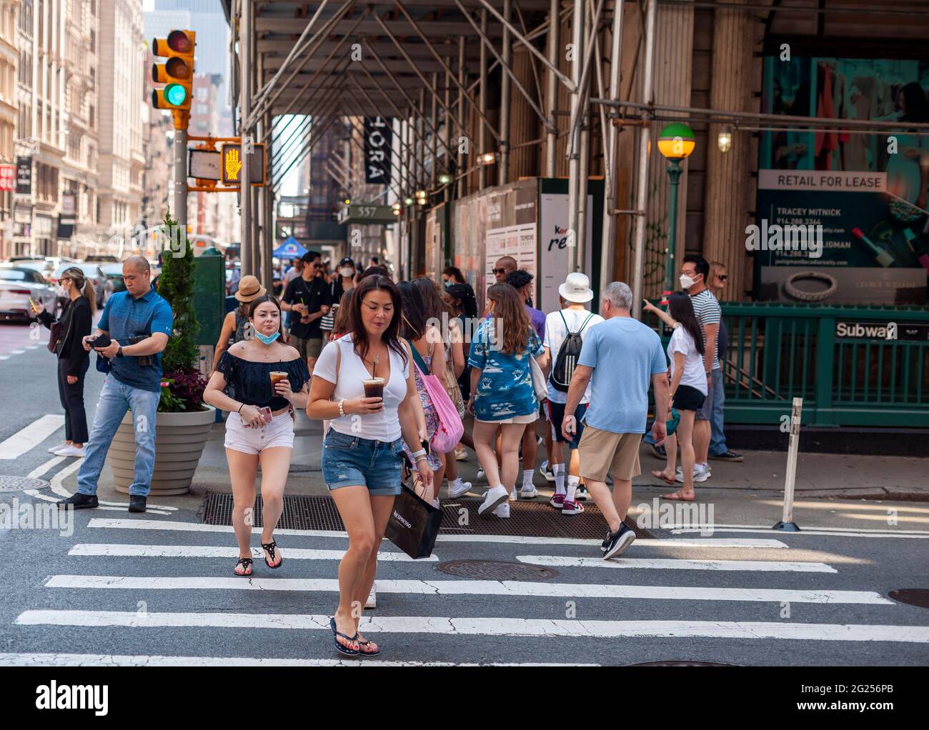 Shoppers in the Soho neighborhood in New York on Sunday, June 6, 2021. New York has relaxed mask mandates allowing most outdoor activities to be mask free as well as many indoor settings, with caveats. (© Richard B. Levine) Stock Photo