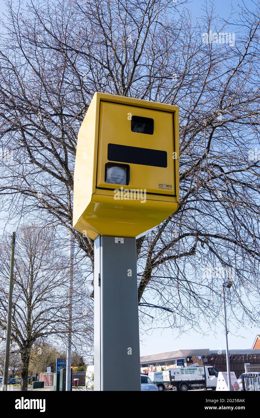 Yellow speed camera by side of road in Moreton Wirral May 2021 Stock Photo