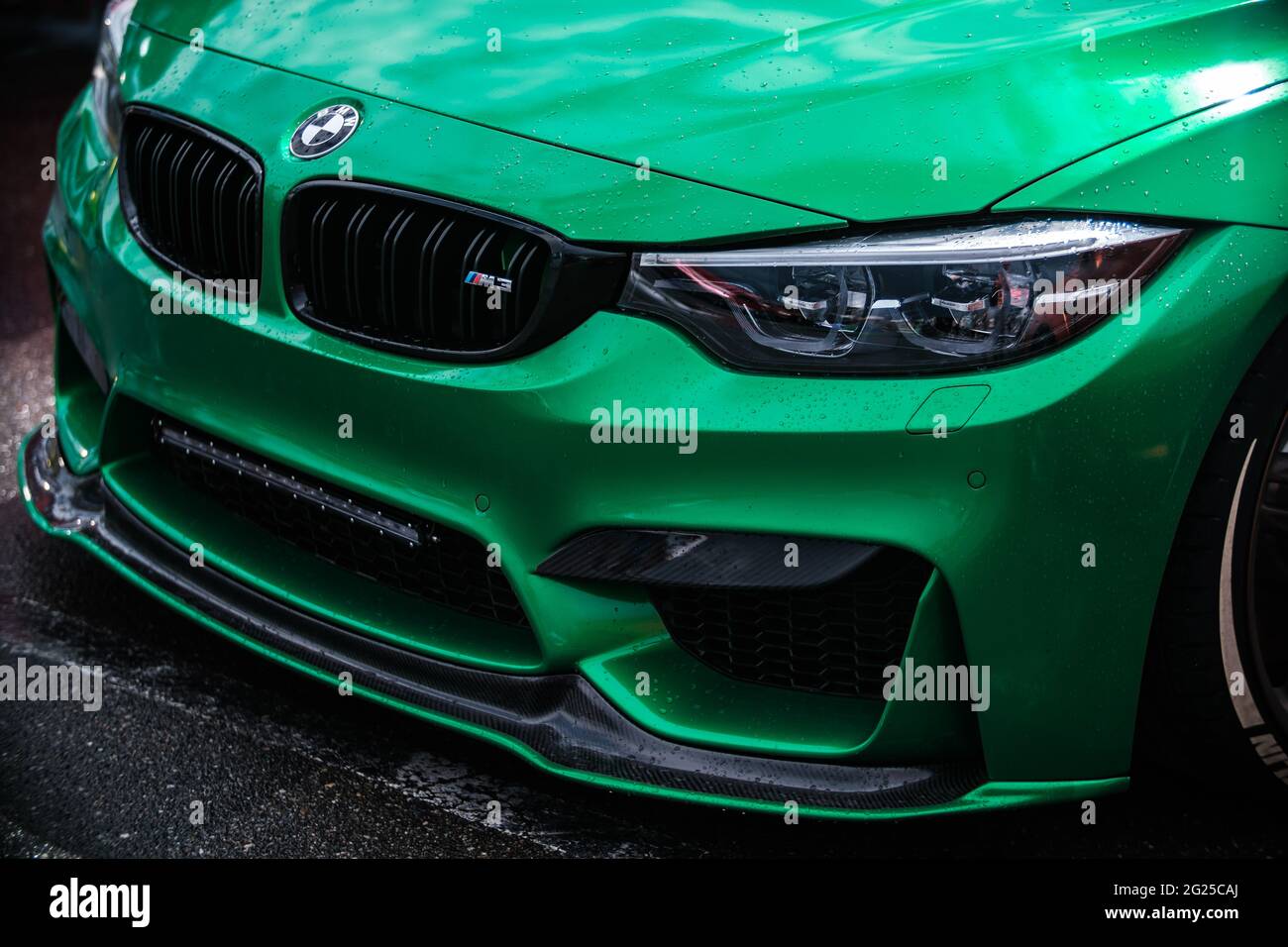 KYIV-15 MAY,2021: Green BMW M3 F80 car wrapped in chrome vinyl wrap, custom  wide body kit with carbon fiber parts and front spoiler on Drift And Cars  Stock Photo - Alamy