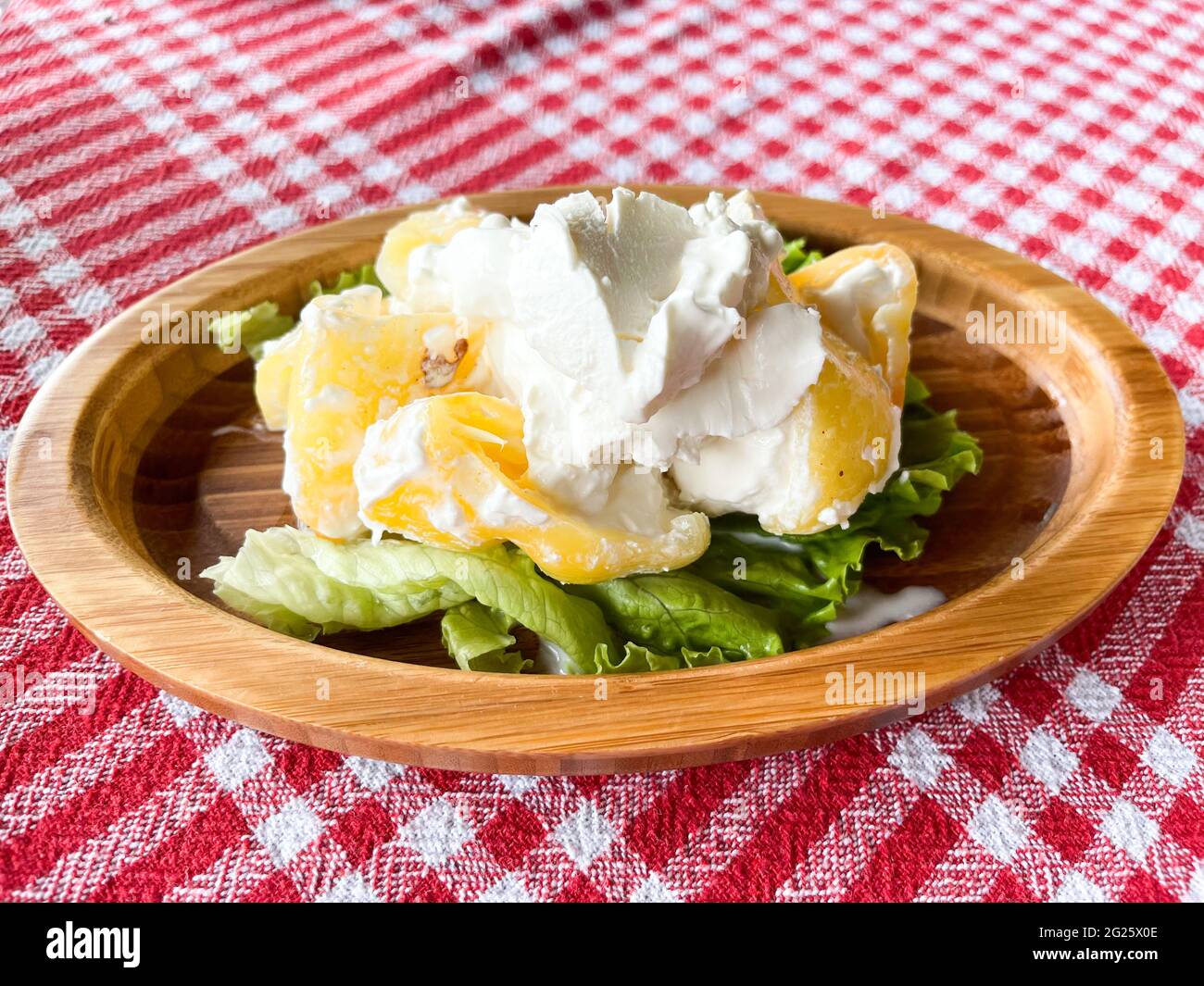 Albanian traditional food fresh peppers with sour cream. Stock Photo