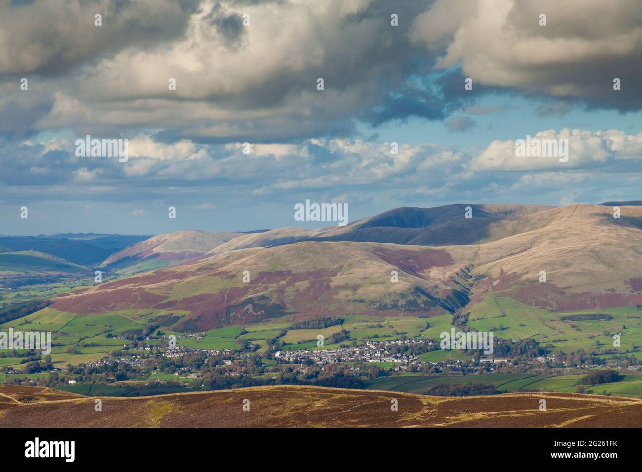 Sedbergh with the Howgill Fells in the background from the summit of Calf Top Stock Photo