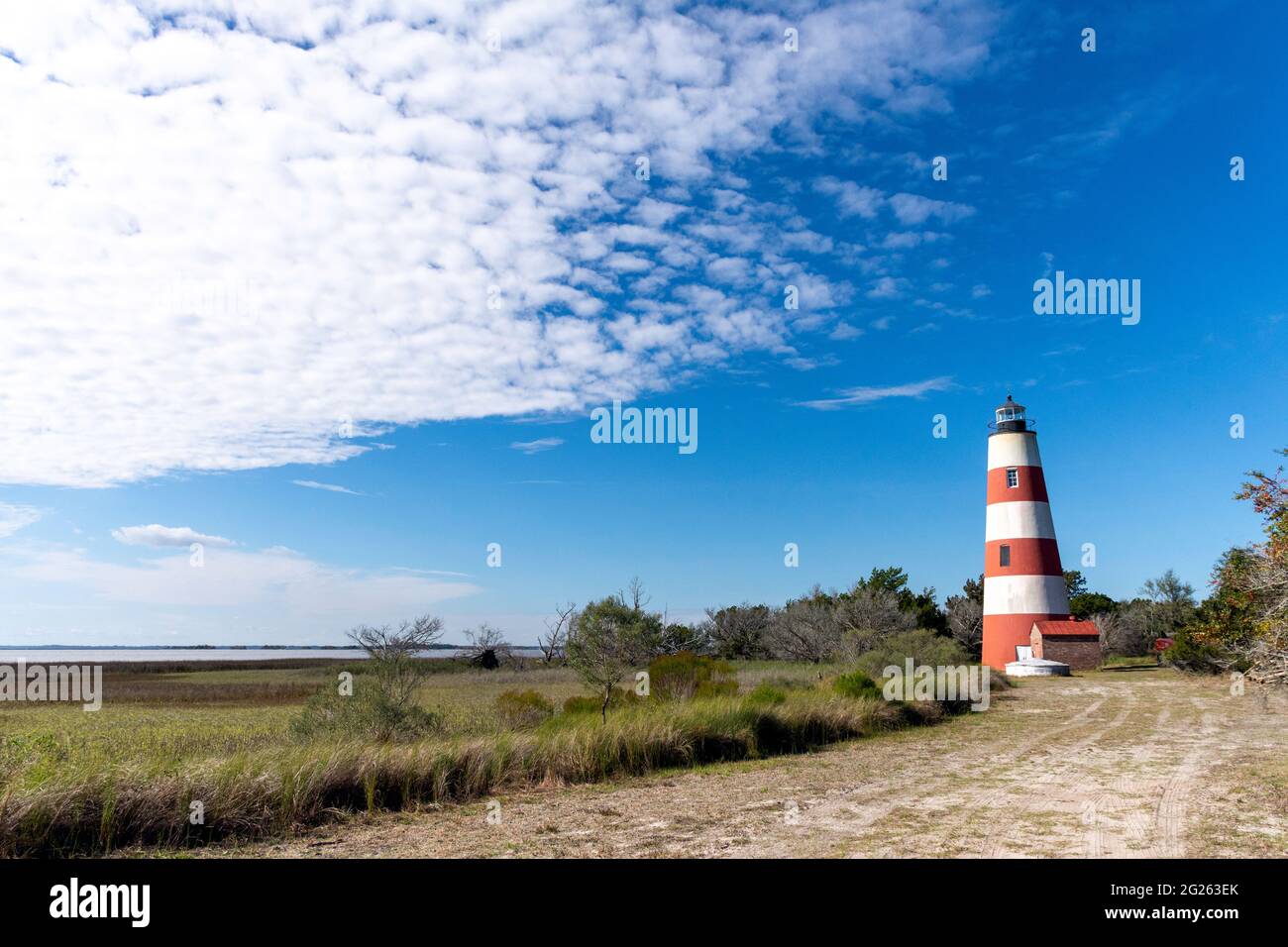 The lighthouse at Sapelo Island, Georgia, USA, the state's fourth largest barrier island and a slow travel destination. Stock Photo