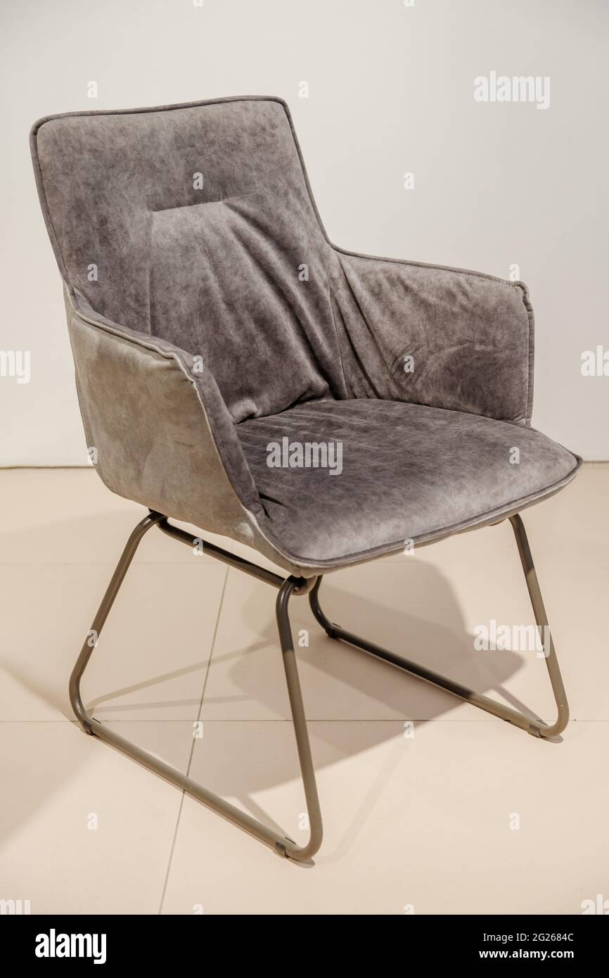 Modern velour chair on metal legs, contemporary style Stock Photo Alamy