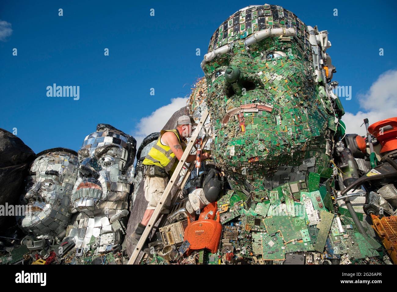 EDITORIAL USE ONLY Mount Recyclemore: The E7, which has been created out of e-waste, in the likeness of the G7 leaders and in the style of Mount Rushmore by British artist Joe Rush for tech recommerce expert musicMagpie, is unveiled on Sandy Acres Beach in Cornwall ahead of the G7 Summit starting later this week. Picture date: Tuesday June 8, 2021. Stock Photo