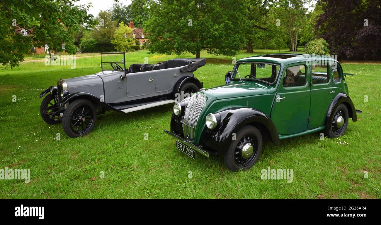 Vintage Morris 8 and Austin Motor Cars parked on Ickwell Village Green. Stock Photo