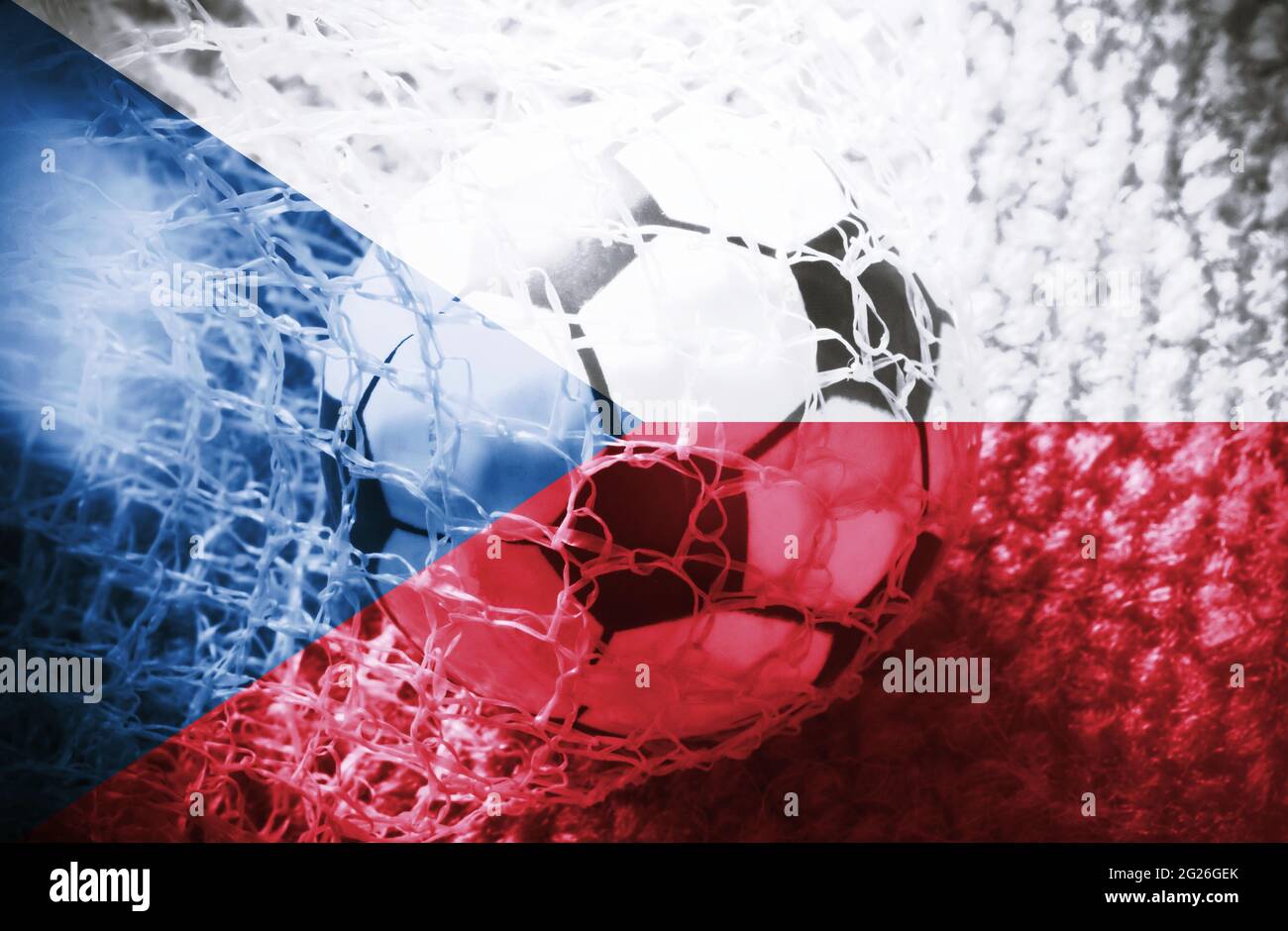 Soccer ball inside the net, with the Czech flag as background. Concept of Czech Republic Soccer team Stock Photo