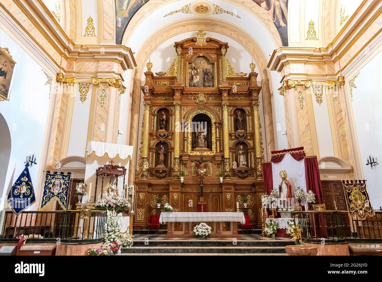 Cazorla, Jaen, Spain - May 18 , 2021:  Main altar of the parrish of Santa Maria (Church of San Jose) with the Image of La Virgen de la Cabeza, patron Stock Photo