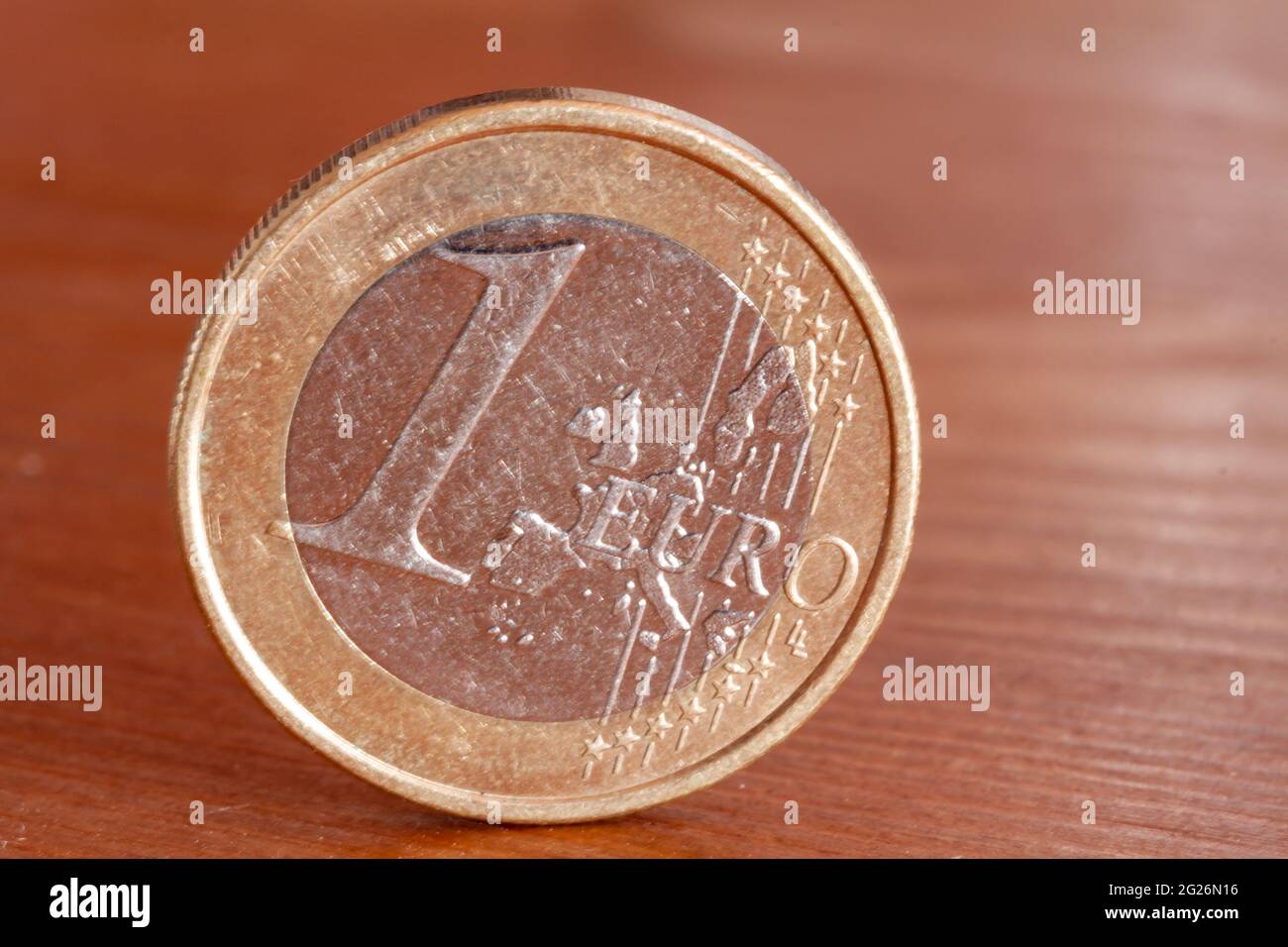 Eurocent on a wooden table Stock Photo