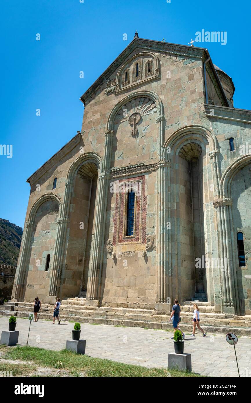 Svetitskhoveli Cathedral of Mtskheta, Georgia and visitors. It is an Eastern Orthodox cathedral, the second largest church building in Georgia. Stock Photo