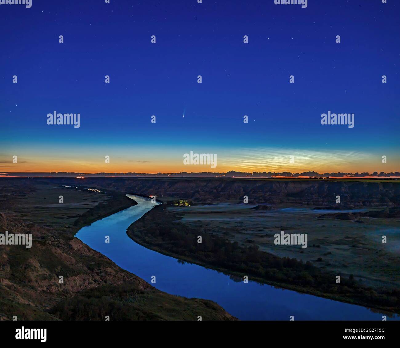 Comet NEOWISE over the Red Deer River in Alberta, Canada. Stock Photo