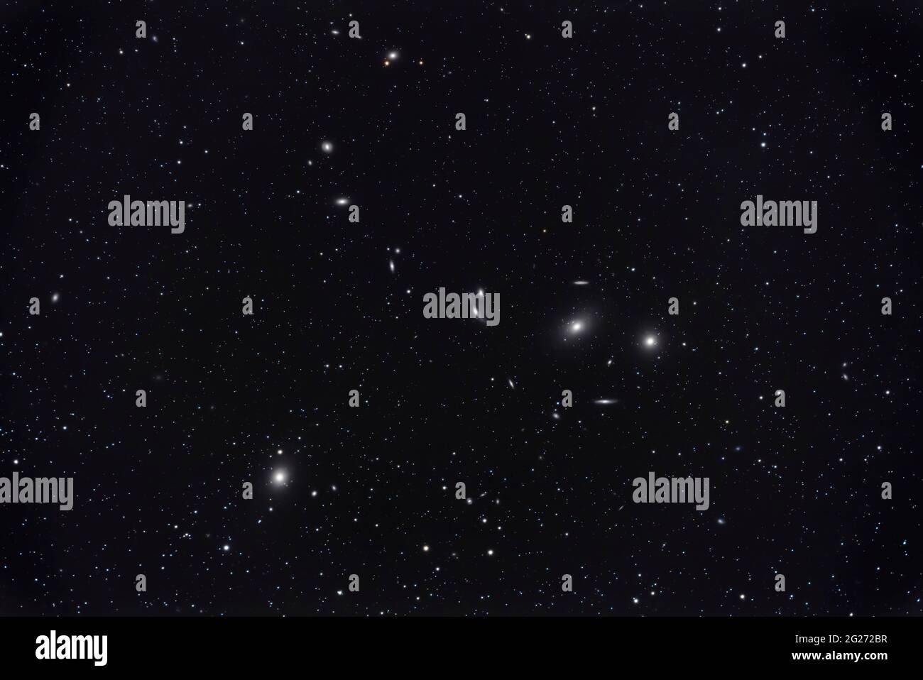 The heart of the Coma-Virgo galaxy cluster known as Markarianâ€™s Chain. Stock Photo