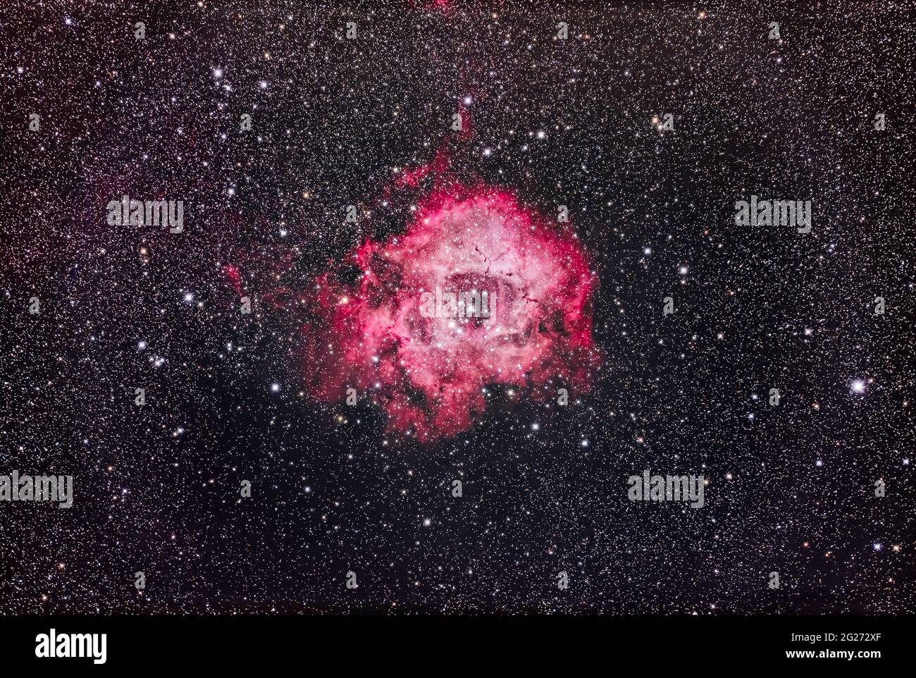 The Rosette Nebula, an emission nebula in Monoceros. Stock Photo
