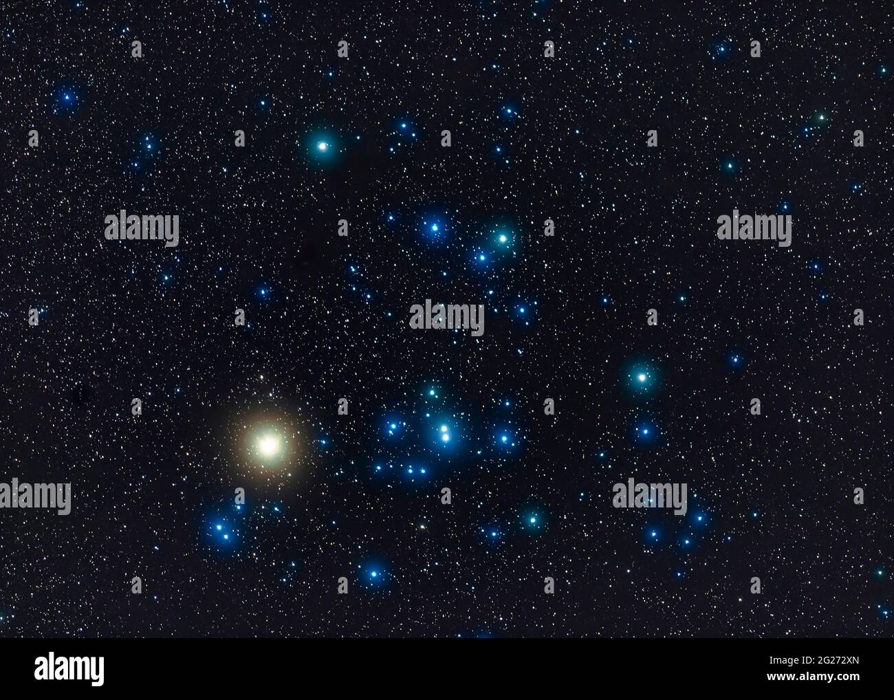 The Hyades star cluster with the red giant star Aldebaran. Stock Photo