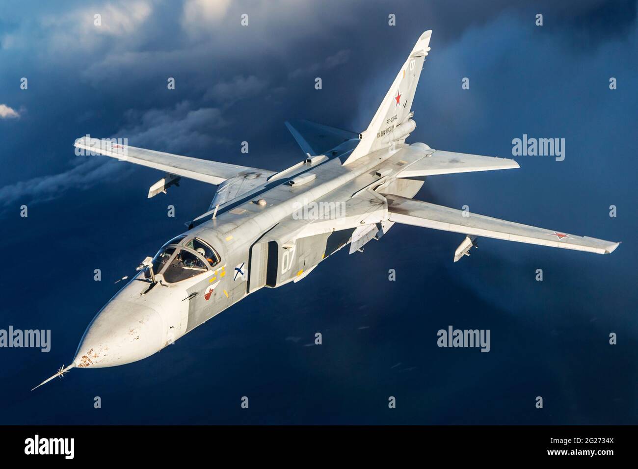 Su-24M frontline bomber plane of the Russian Navy flying over Kaliningrad Region, Russia. Stock Photo