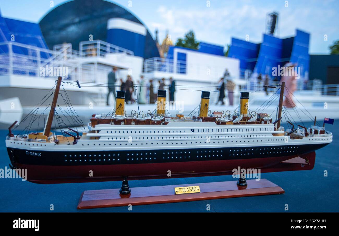 Schwerin, Germany. 07th June, 2021. The model of the legendary passenger ship stands at the edge of the stage in the musical 'Titanic' at the Schwerin Castle Festival. The Mecklenburg State Theatre Schwerin starts the open-air season in Mecklenburg-Vorpommern on 11.06.2021 with the musical 'Titanic'. Up to 600 visitors are allowed to the performances with 65 actors on the stage between the castle and the state theatre. Actually, the grandstands can hold 2,000 spectators. Credit: Jens Büttner/dpa-Zentralbild/dpa/Alamy Live News Stock Photo