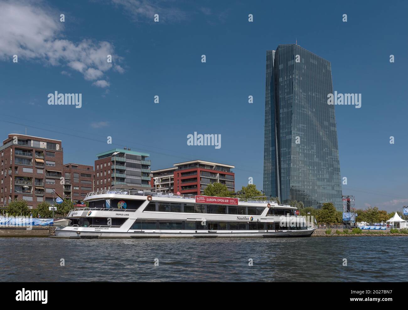 Tourist cruise boat on the Main river in front of the building of the European Central Bank, Frankfurt, Germany Stock Photo