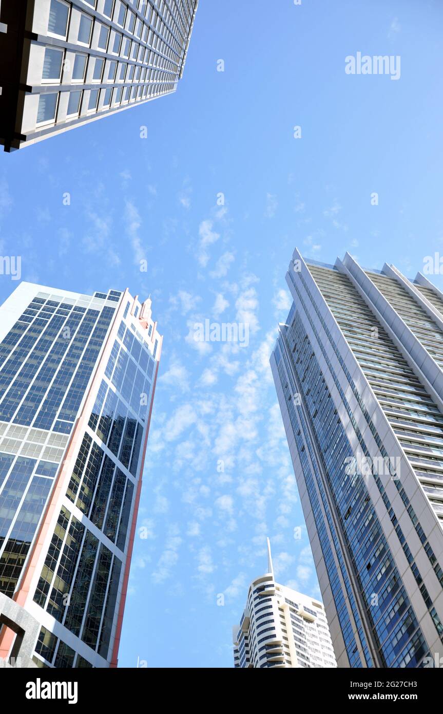 Group of buildings in the city on blue sky background Stock Photo Alamy