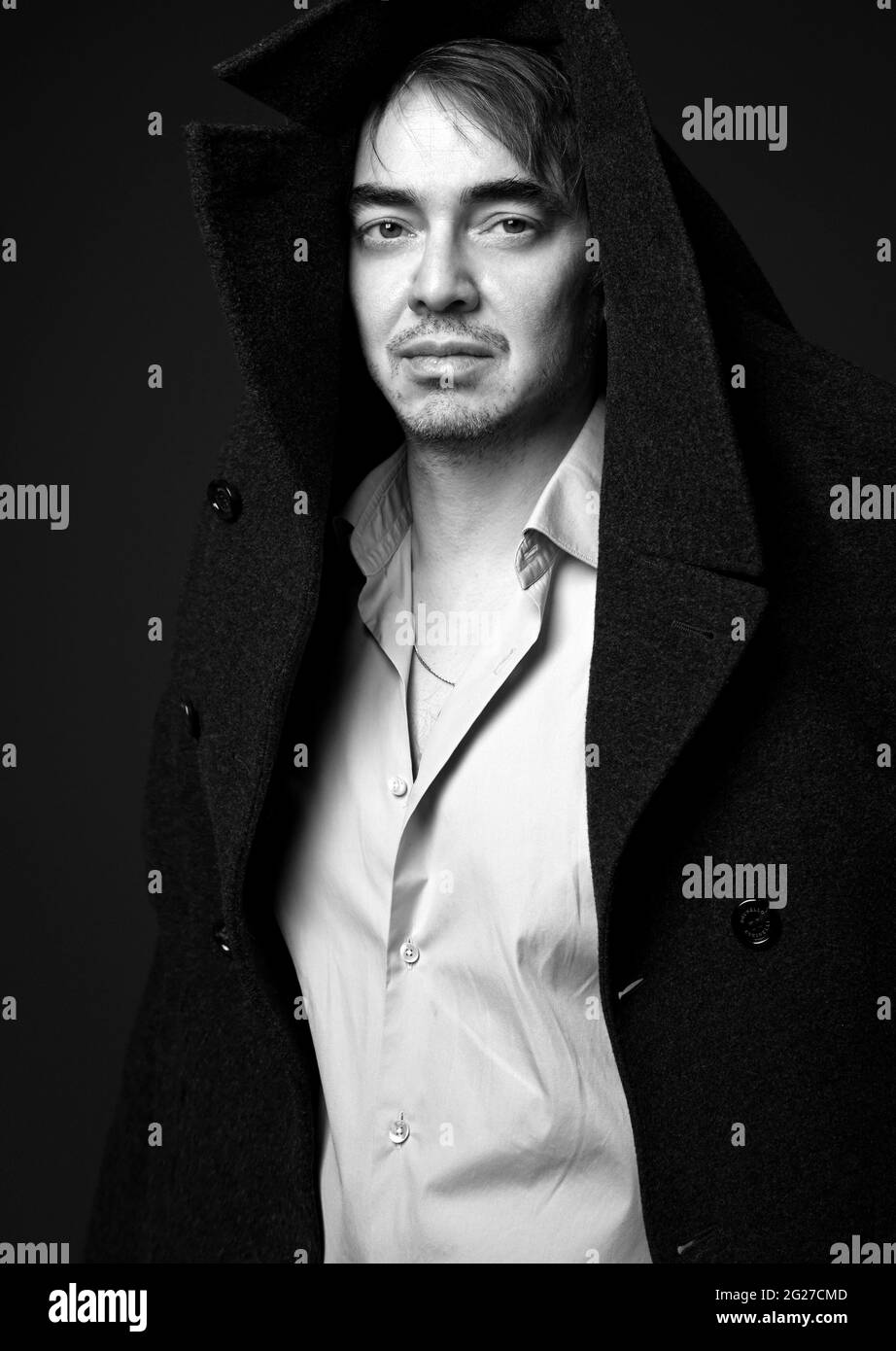 White shirt black coat hires stock photography and images Alamy