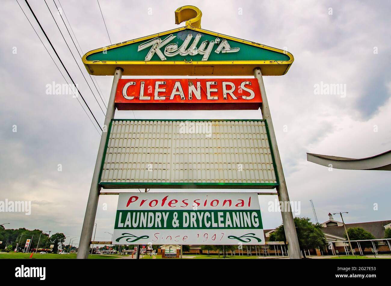 The iconic coat hanger sign of Kelly’s Cleaners is pictured, July 10, 2016, in Mobile, Alabama. The dry cleaners has been in business since 1946. Stock Photo