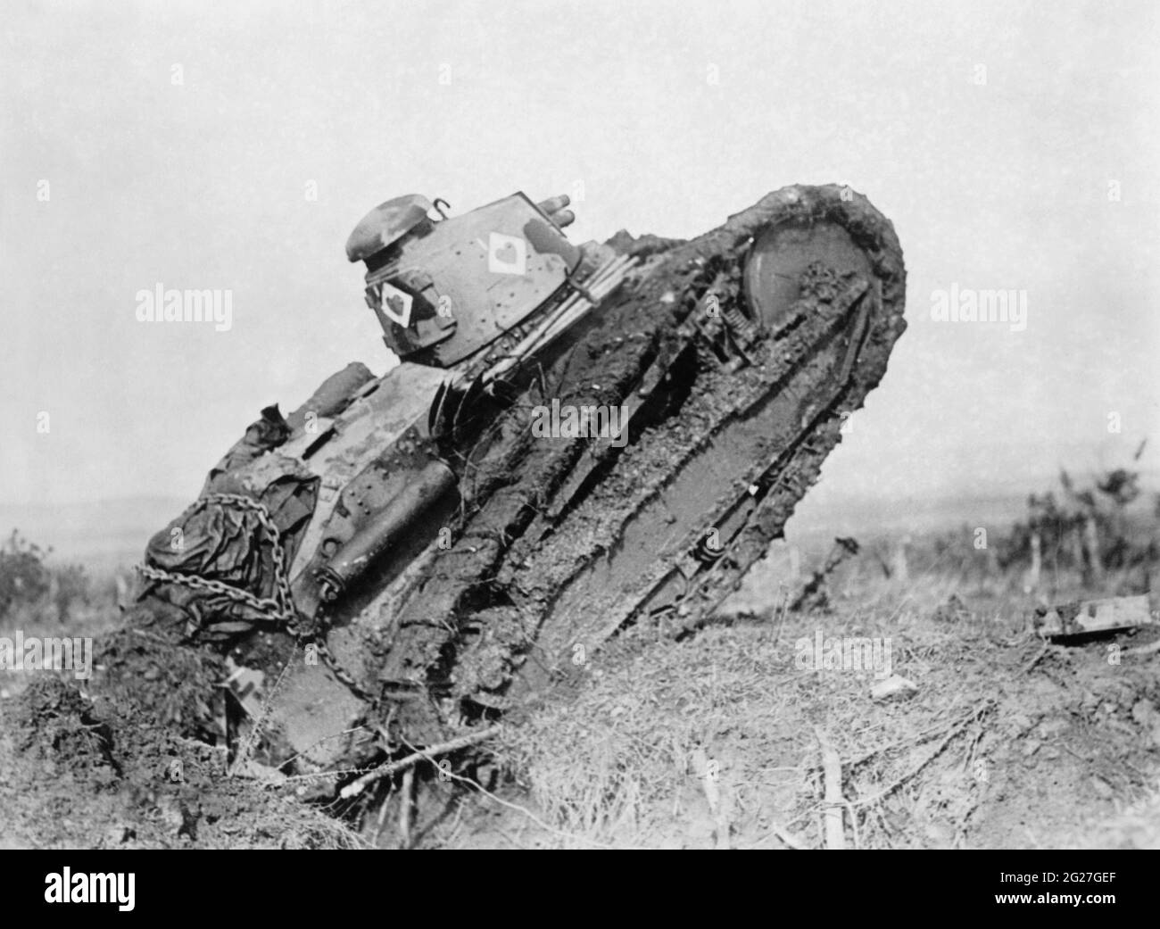 A French Renault FT 17 tank blasting through a trench during World War I. Stock Photo