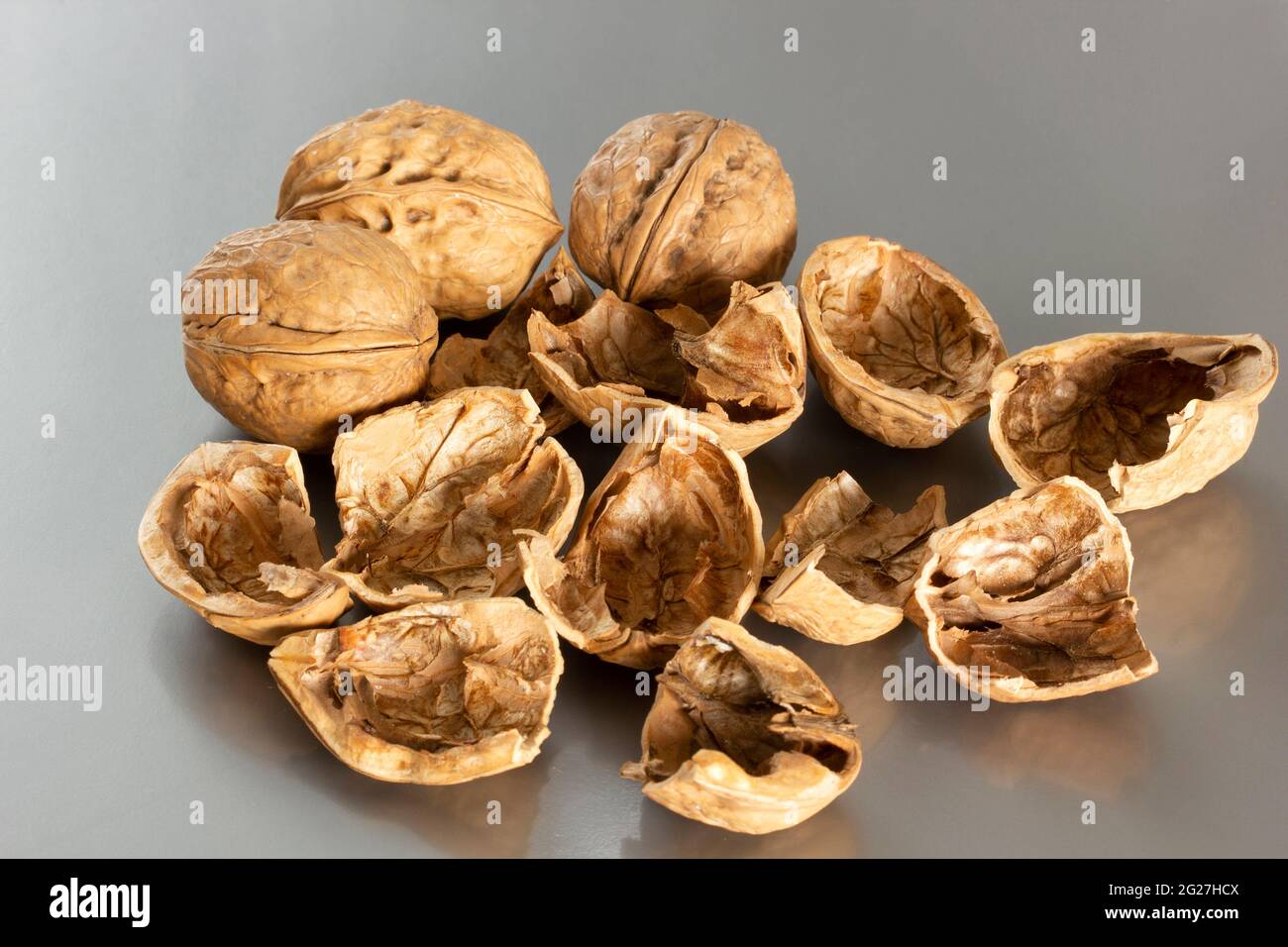 walnut shell and walnut texture background Stock Photo - Alamy