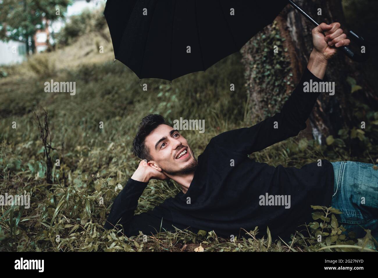 Hiking man in rain forest hi-res stock photography and images - Alamy