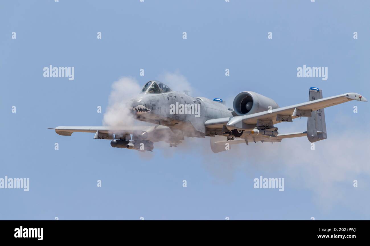 A U.S. Air Force A-10 Thunderbolt II fires its 30mm cannon. Stock Photo