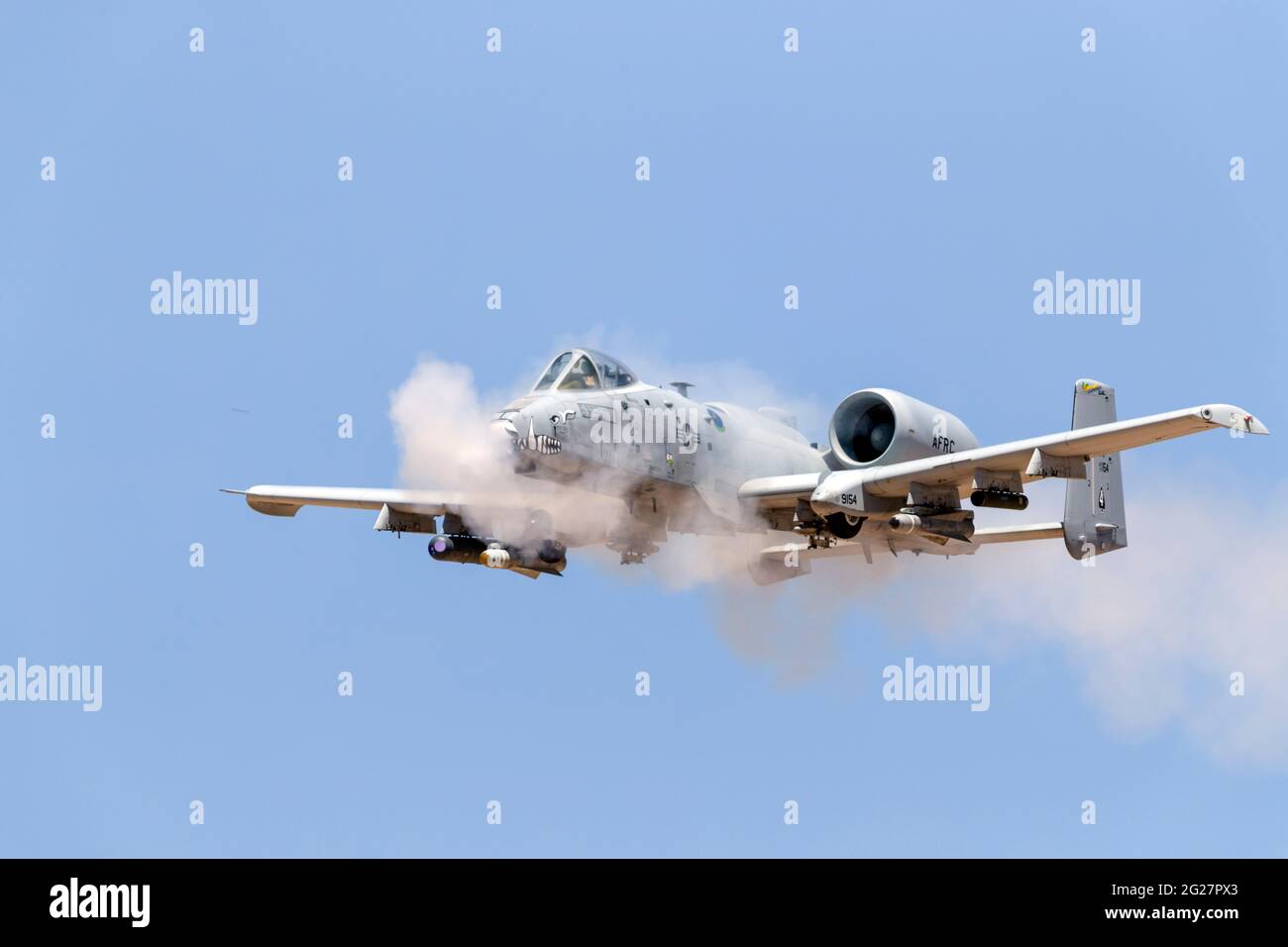A U.S. Air Force A-10 Thunderbolt II fires its 30mm cannon. Stock Photo