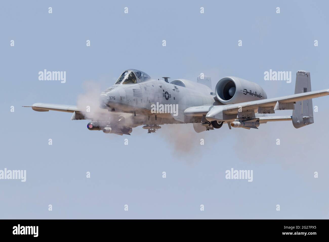 A U.S. Air Force A-10 Thunderbolt II fires its 30mm cannon. Stock Photo