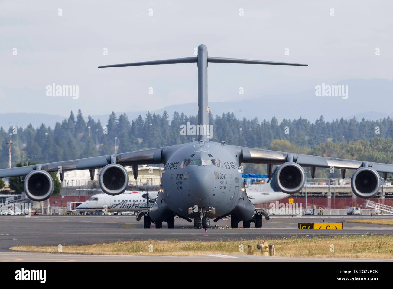 A U.S. Air Force C-17 Globemaster III taxis in after landing. Stock Photo