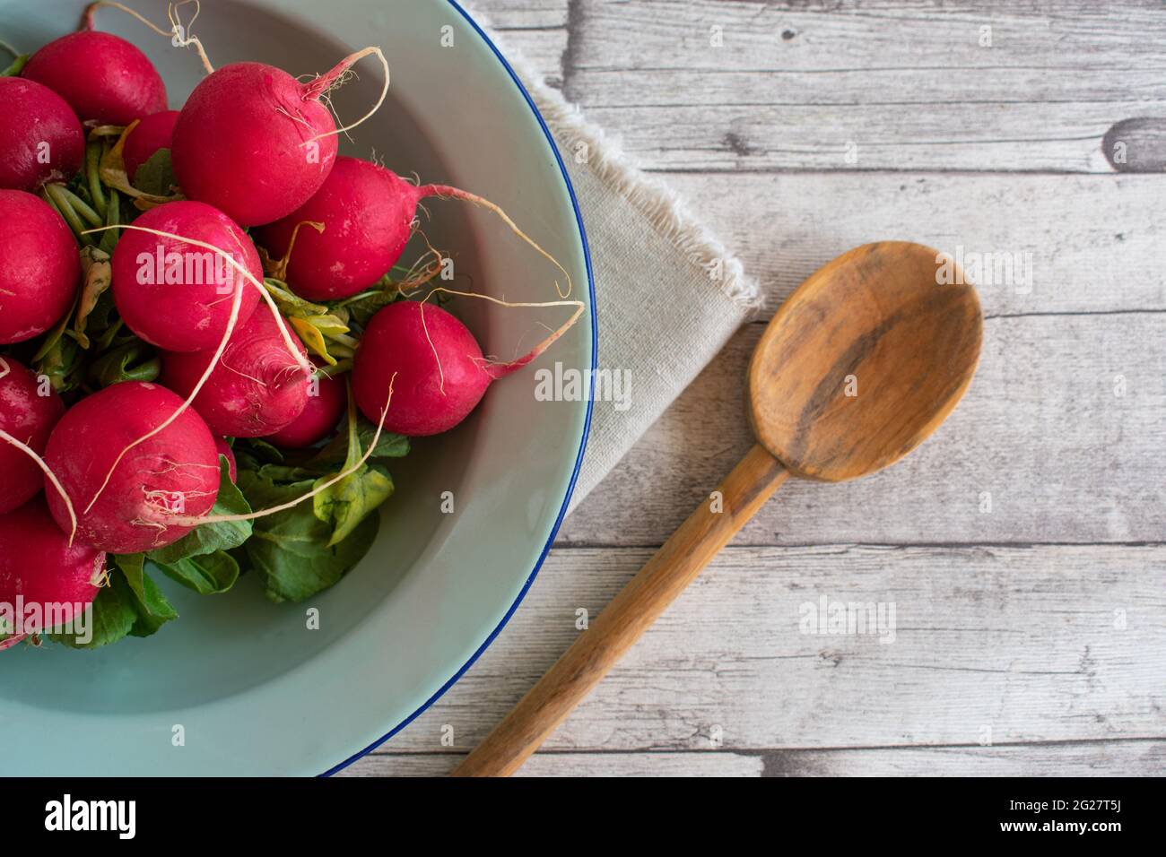 Red radish on rustic wooden table background with copy space Stock Photo