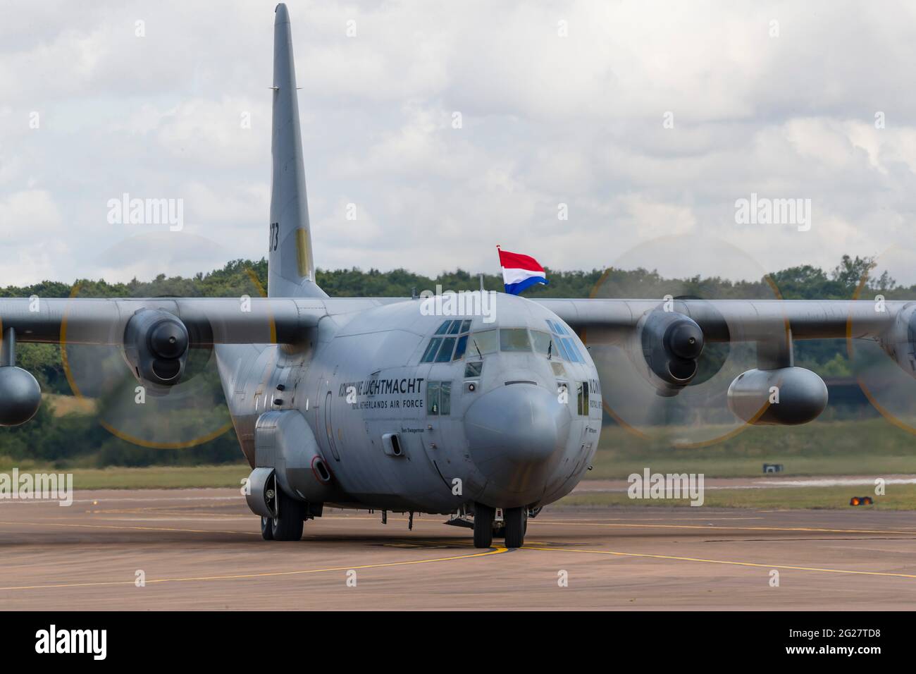 A Royal Dutch Air Force C-130 Hercules taxis in after landing. Stock Photo