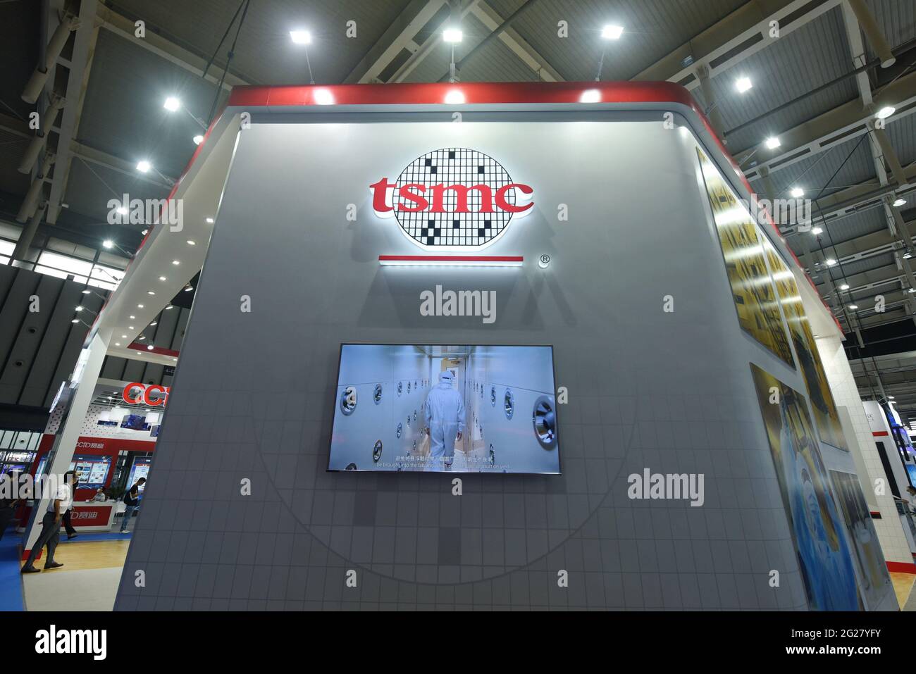 NANJING, CHINA - JUNE 9, 2021 - Visitors look at Taiwan Semiconductor's ...